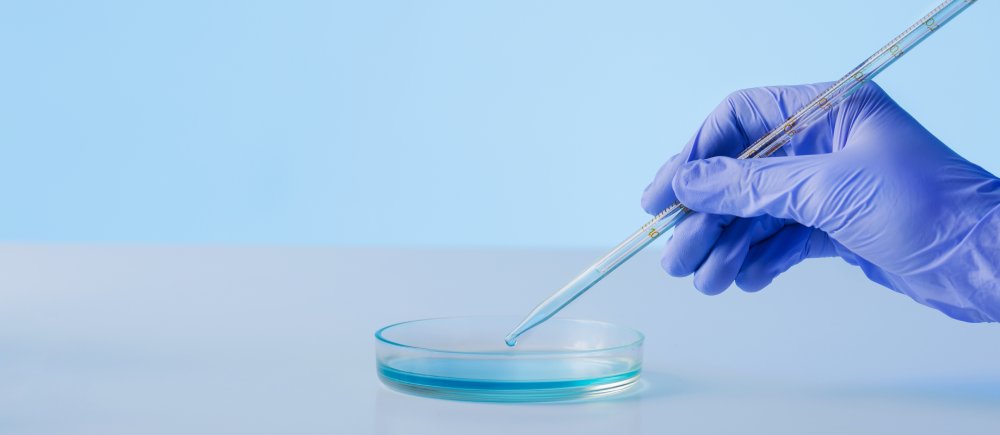 side-view-scientist-wearing-protection-glove (1)